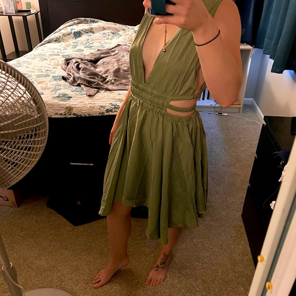 New never worn dress that is a medium but fits a little larger at the bust.